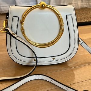 Ivory leather ring bag